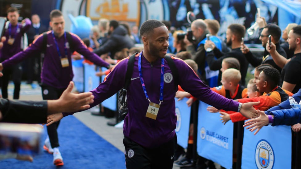 HAND IT TO RAZ : Raheem exchanges high-fives with the City fans as the team makes its entrance