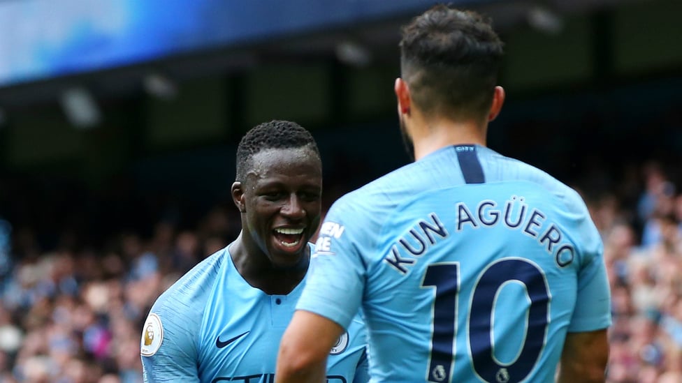 MERCI, MENDY! : Sergio Aguero thanks Benjamin Mendy for his assist, having completed his hat-trick with a glorious flick