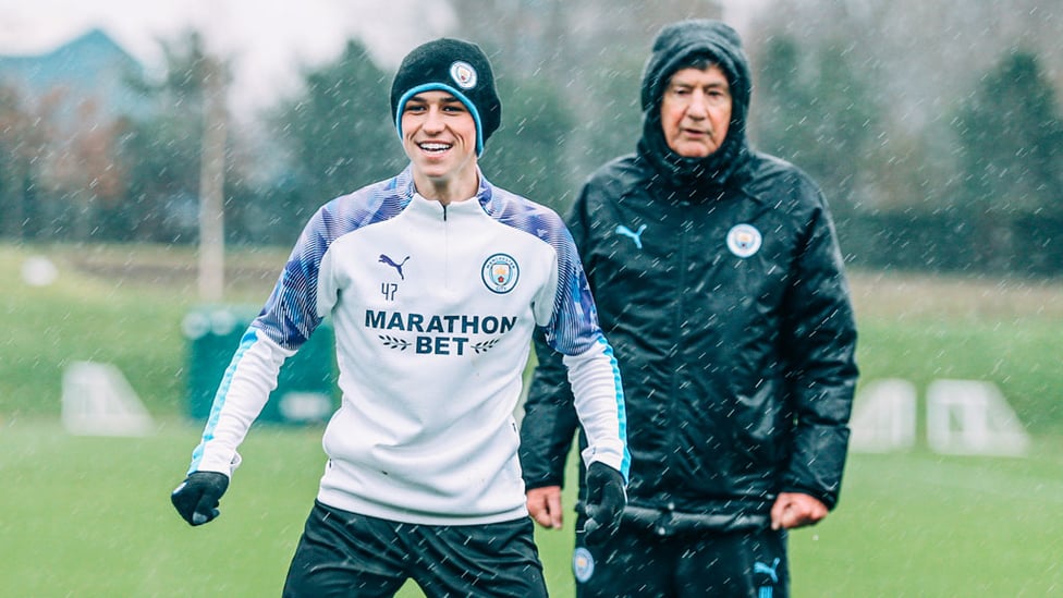 WET, WET, WET: That didn't stop Phil Foden from smiling!