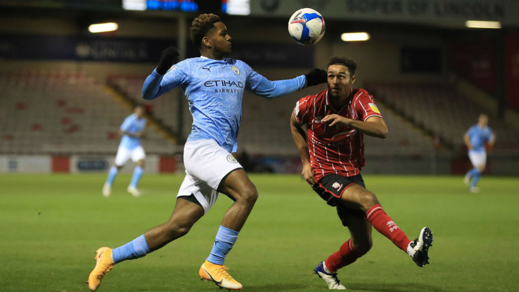 ON THE BALL: Jayden Braaf vies for possession against Lincoln's Liam Bridcutt