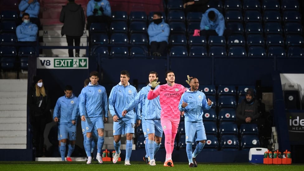 GAME TIME : Skipper Sterling leads the team out at the Hawthorns.