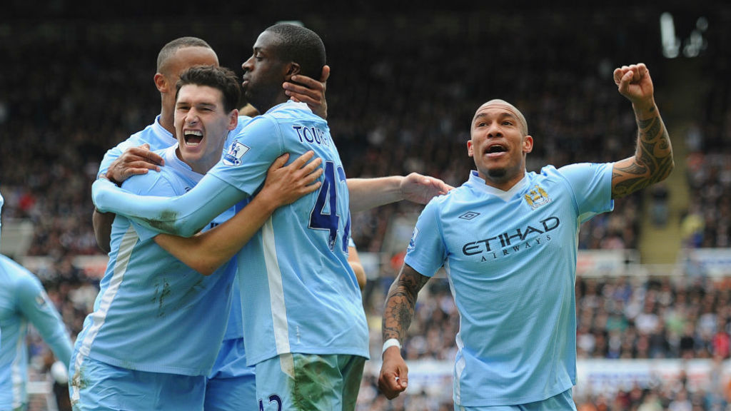 THAT WINNING FEELING: Gareth Barry celebrates with Yaya Toure and Nige De Jong during our crucial win at Newcastle in 2012