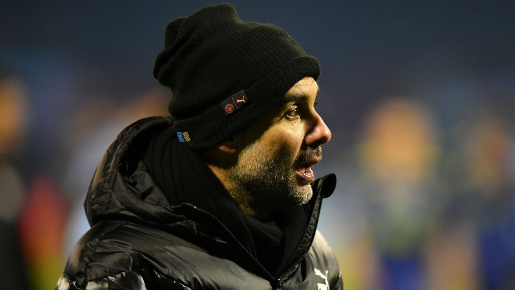 MATCH MODE : Pep Guardiola watches on from the sideline.