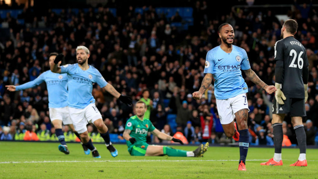 STRIKE ONE : Raheem Sterling is all smiles after netting the Blues' first goal v Watford