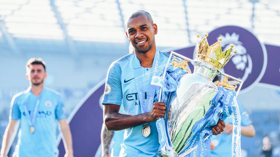 CROWN JEWEL : Ferna proudly holds the Premier League trophy after 2019 title defence