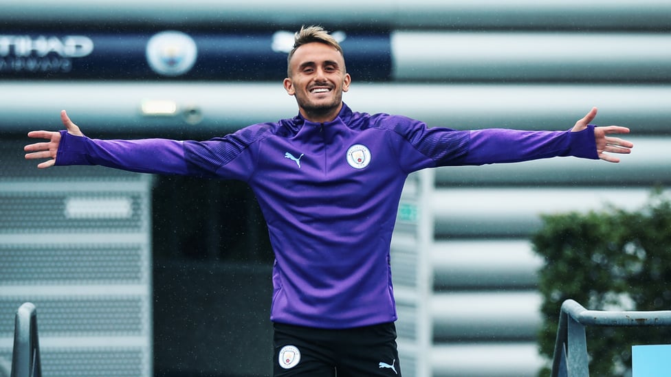 SINGING IN THE RAIN : Aleix Garcia smiles for the camera