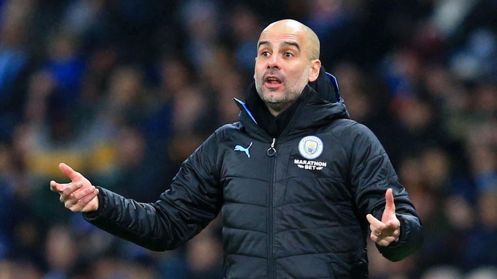 SIDELINE: Pep Guardiola delivers his instructions against Port Vale.