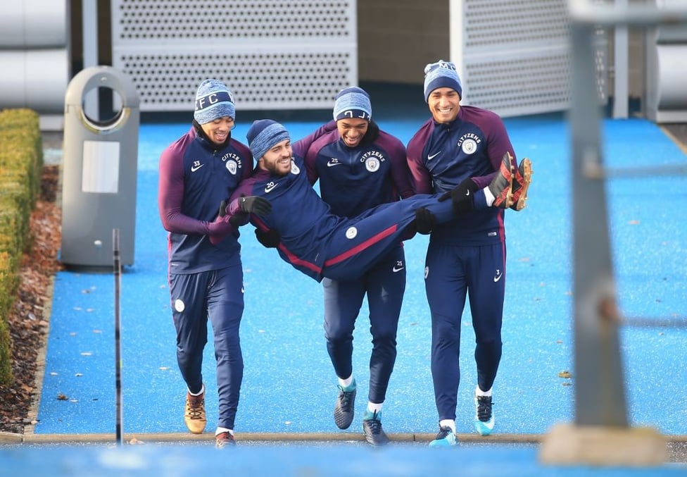 Team-mates... : Bernardo is always in the middle of the training ground fun - and often the target!