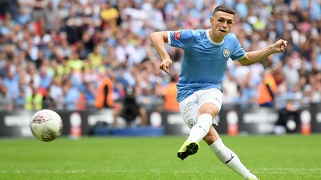 UNFAZED: Phil Foden made no mistake from the spot.