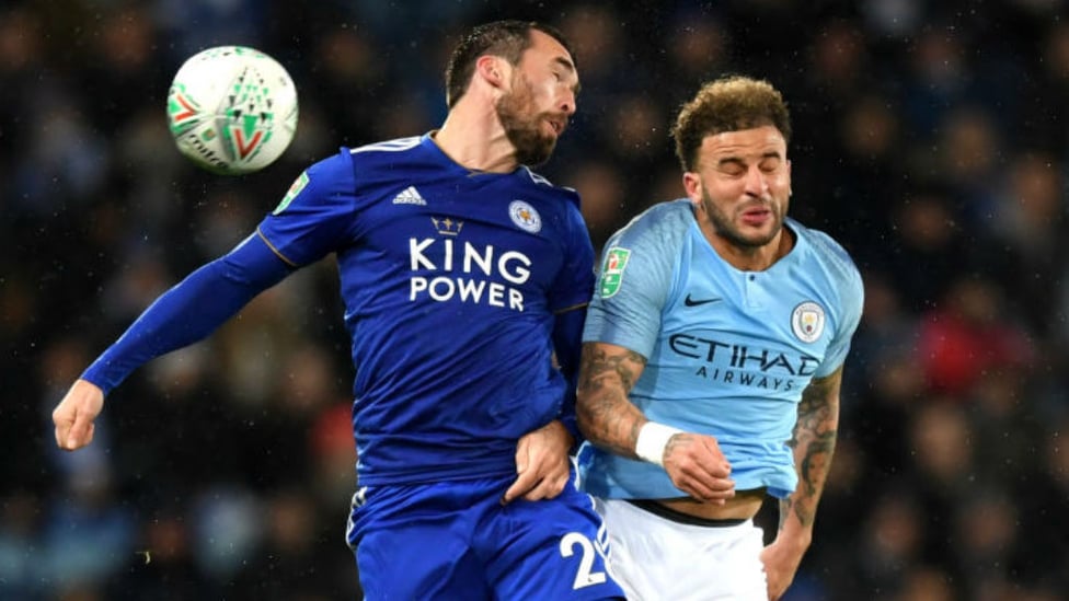 UP FOR IT : Kyle Walker takes on Christian Fuchs in this aerial challenge