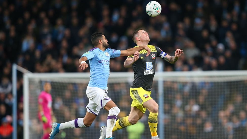 FRONT FOOT : Riyad Mahrez puts Pierre-Emile Højbjerg under pressure early on.