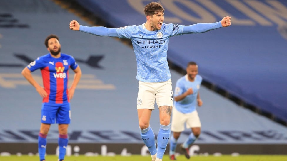 AT THE DOUBLE : Stones celebrates after blasting in his second goal - Aguero would be proud of that!