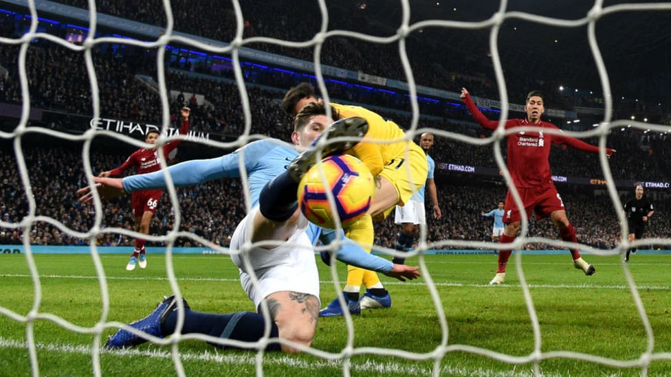 NICK OF TIME : John Stones stops Liverpool scoring by the narrowest of margins