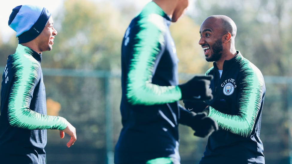 BEAMING : Fabian Delph and Gab J share a joke.