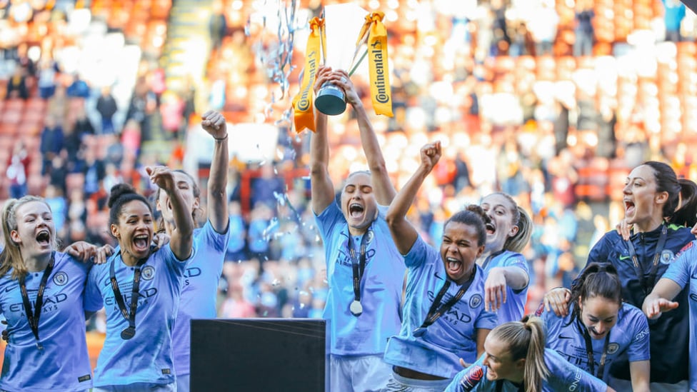 UP FOR THE CUP : The smiles say it all as City lift the Continental Cup