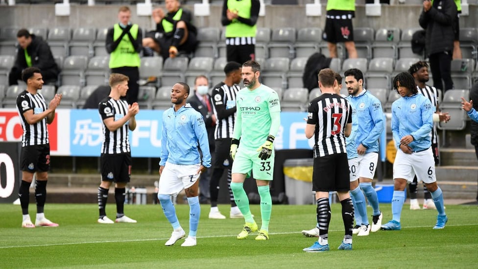 GUARD OF HONOUR: The Newcastle players congratulate the lads on being crowned Premier League champions