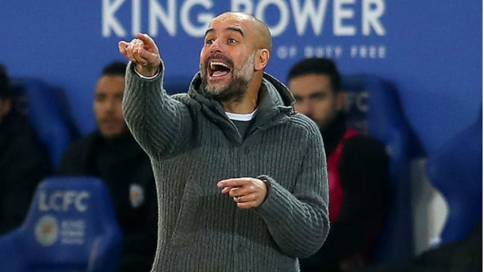 FESTIVE POINTER : Pep Guardiola passes on some intructions