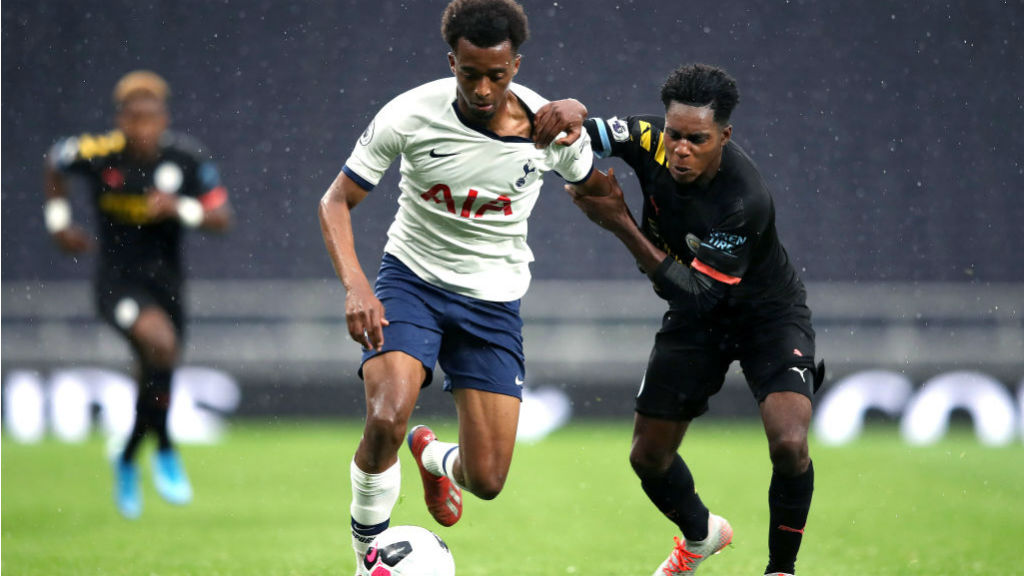 ACTION STATIONS : Jeremie Frimpong challenges Spurs' Tashan Oakley-Boothe