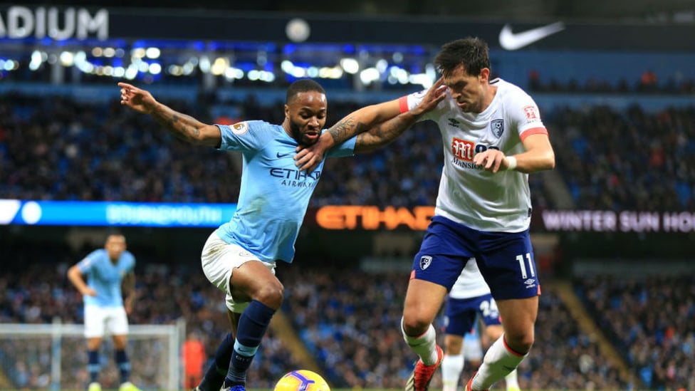 STERLING WORK : Raheem tries to go past Charlie Daniels EIGHT