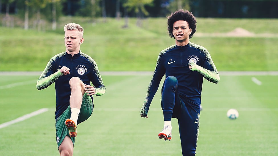 KNEES UP : Oleksandr Zinchenko and Leroy Sane limber up