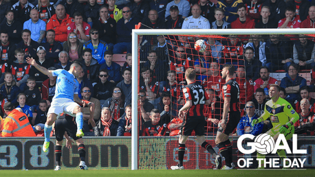 THAT LEAP: Sergio Aguero jumps high into the sky to head to ball into the net