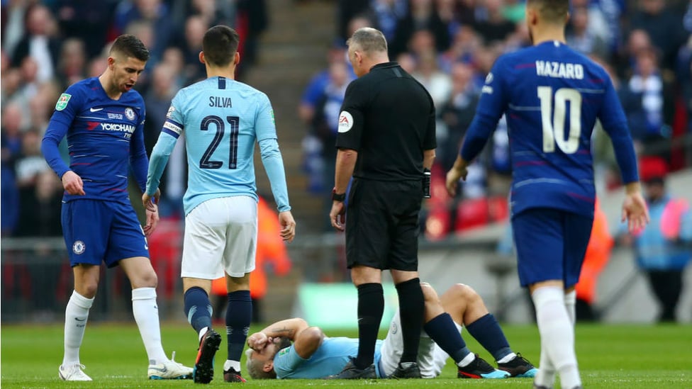 OUCH : Sergio Aguero was blocked by Jorginho barely seconds after kick-off