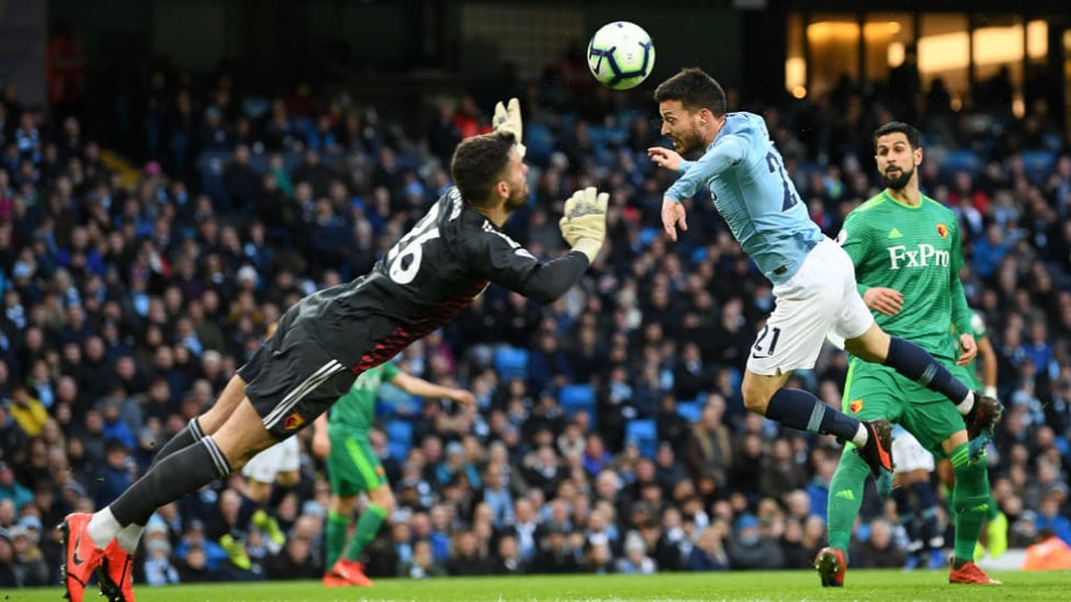 CLOSE! David Silva's glancing header evades Ben Foster but also the Watford goal