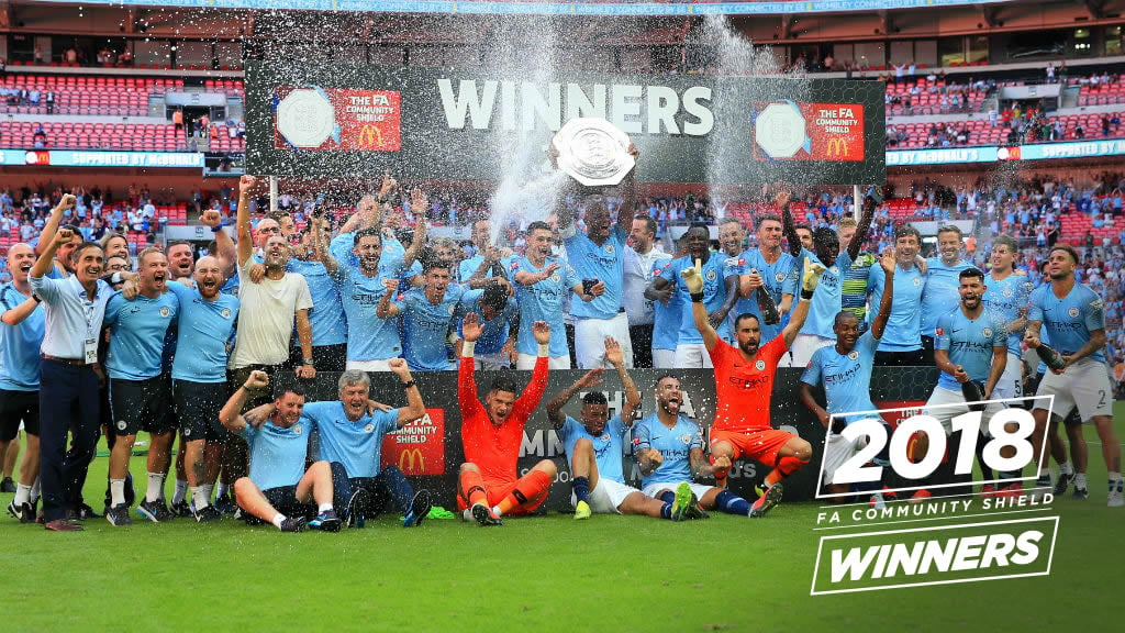 WHAT A FEELING: City lift the trophy