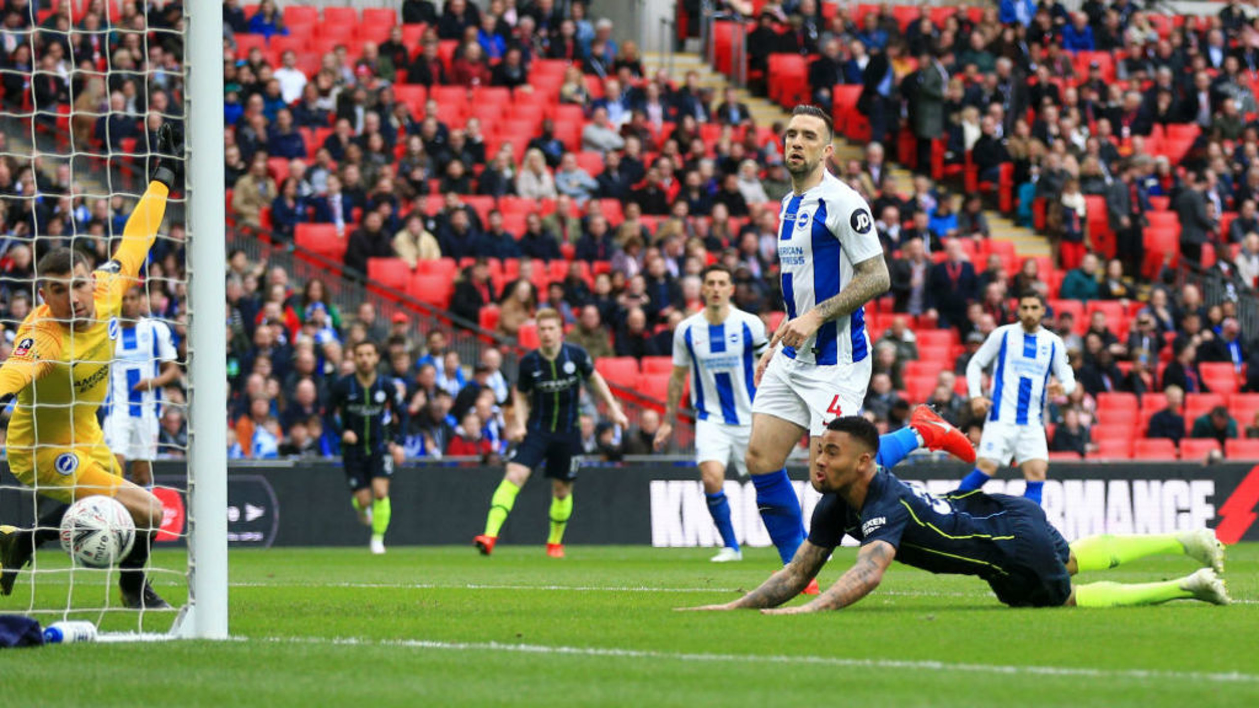 HEAD BOY: Gabriel Jesus stoops to meet Kevin De Bruyne's brilliant cross and guide home City's early opener