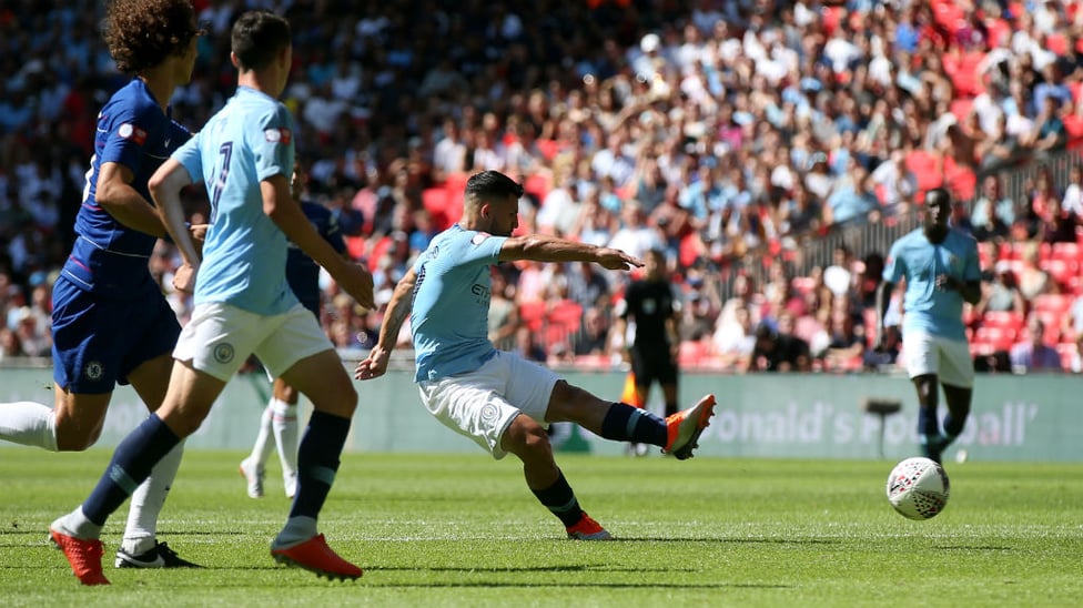 200 UP : Sergio Aguero shoots home against Chelsea at Wembley