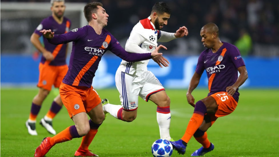 NO ENTRY : Fernandinho and Ayemric Laporte put the squeeze on Lyon dangerman Nabil Fekir