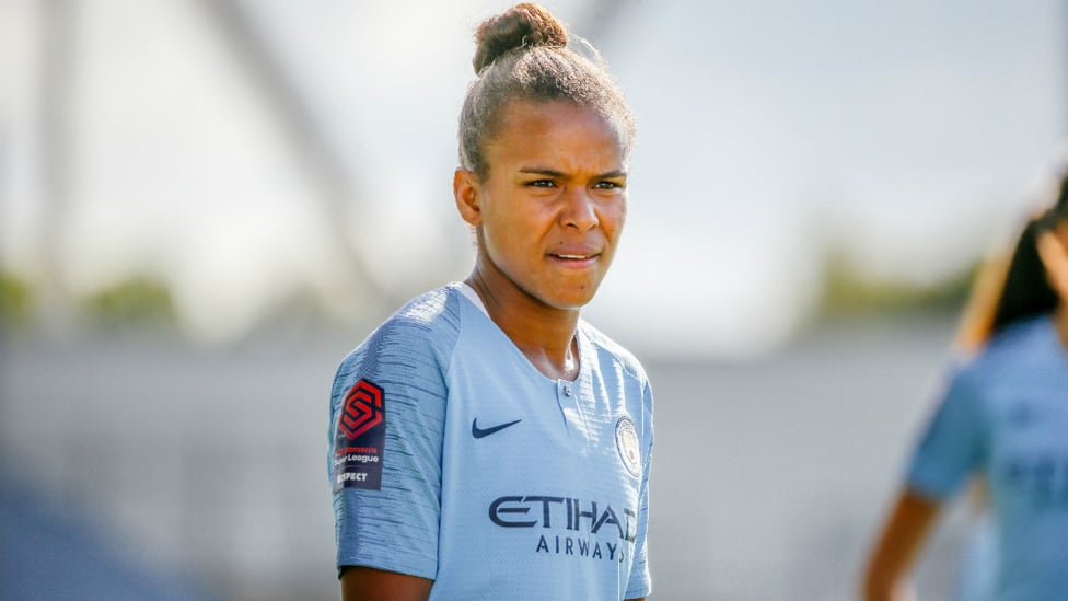 CLOSE-UP : Parris received a commemorative shirt before kick-off to celebrate her 100th appearance