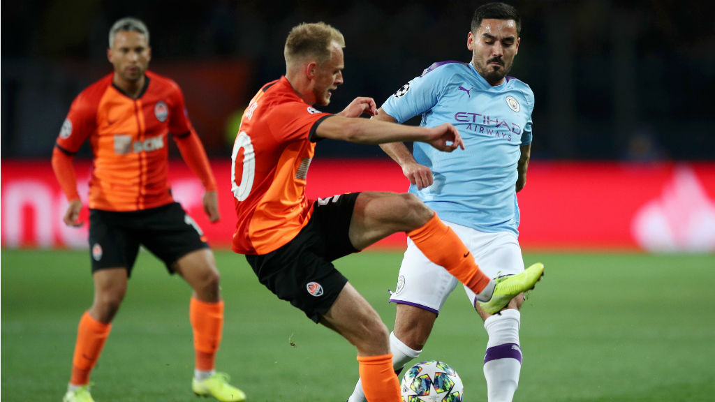 
                        MIDDLES MARCH : Ilkay Gundogan puts the squeeze on the Shakhtar midfield
                