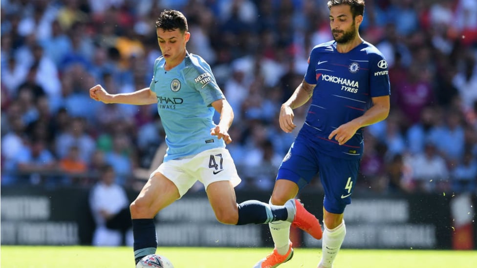 MIDDLE MARCH : Phil Foden looks to set up another City attack