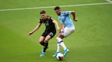 BATTLE: The lively Mahrez is pressurised by Vinagre. 