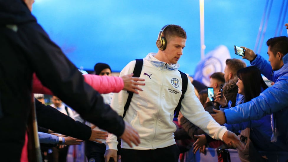 ARRIVAL : De Bruyne greets the fans as he enters the Etihad.