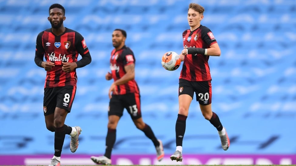 ONE BACK : Brooks celebrates pulling one goal back for the visitors with just two minutes left to play.