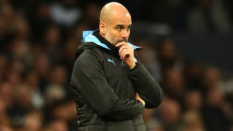 TACTICIAN: Guardiola watches on from the touchline in the first half.