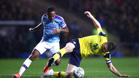 CHALLENGE: Oxford's Rob Dickie and Raheem Sterling