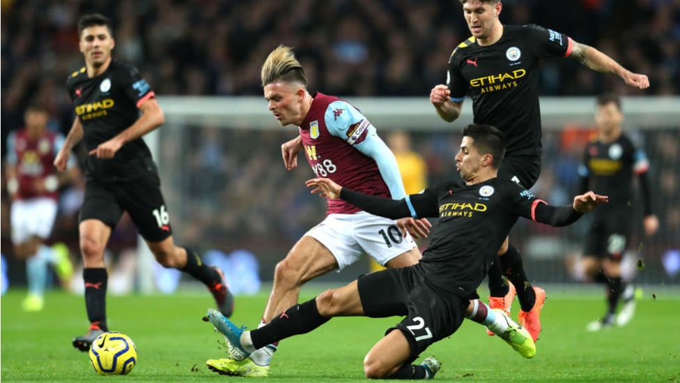 NO ENTRY : Joao Cancelo puts the squeeze on Villa's Jack Grealish