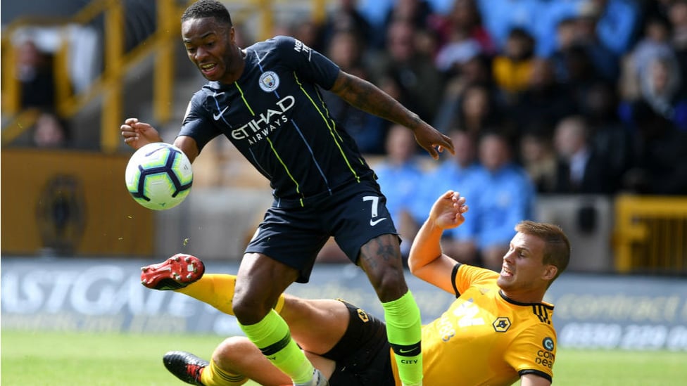 CLOSE CALL : Raheem Sterling is denied by Ryan Bennett's desperate challenge