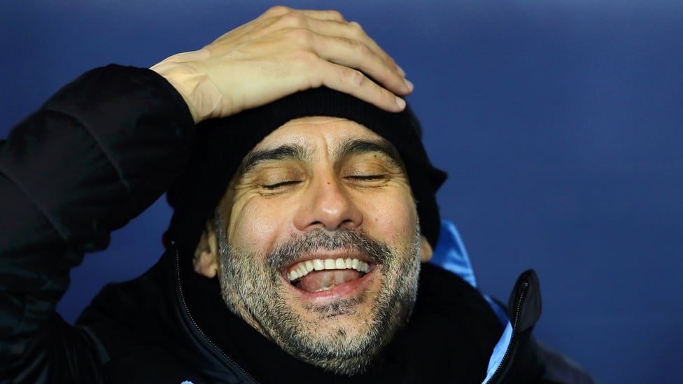 SMILES AWAY : Pep enjoys a joke before kick-off