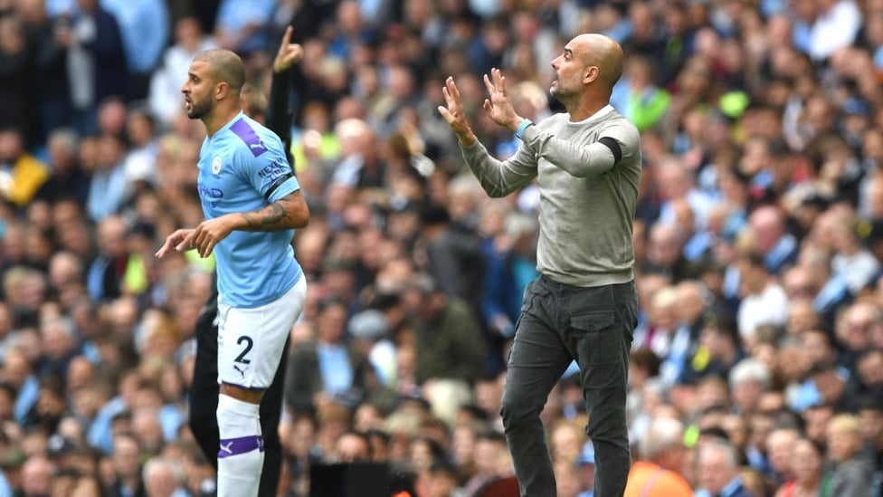 PEP WATCH : The manager issues instructions from the touchline.