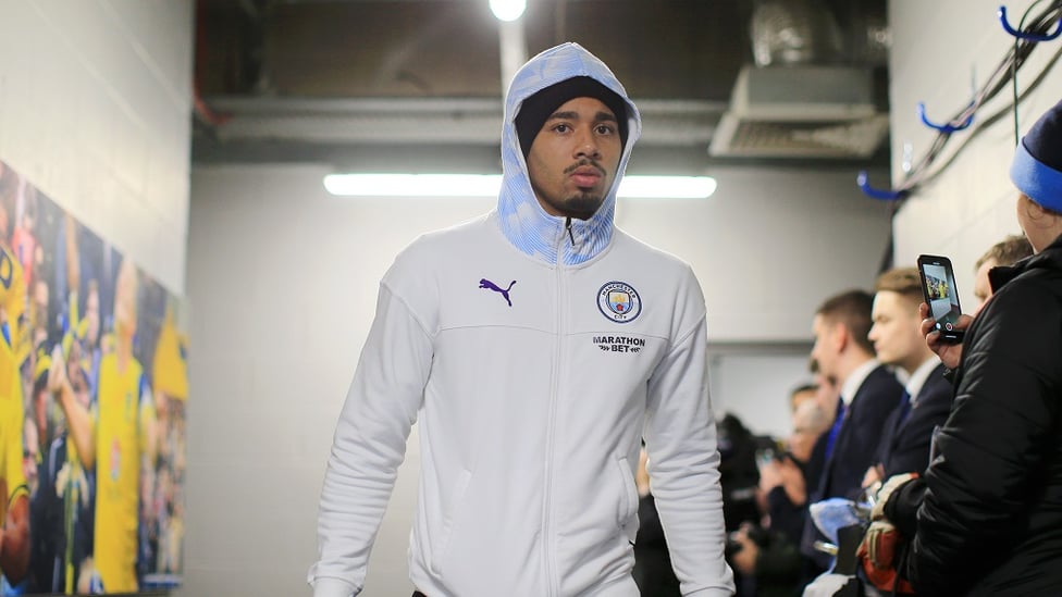 ARRIVAL : Gabriel Jesus is wrapped up against the chilly Oxfordshire night air