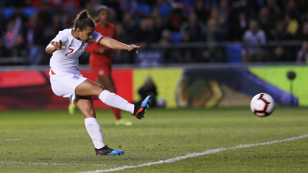 BIG CHANCE : Nikita Parris angles an effort towards the Canada net