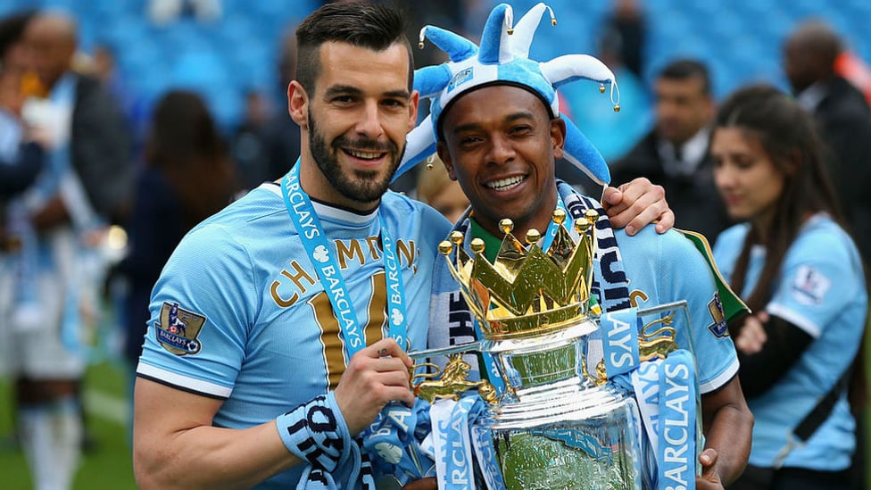 A LEAGUE OF OUR OWN : Ferna and Alvaro Negredo celebrate our Premier League title success at the end of his first season at the Club