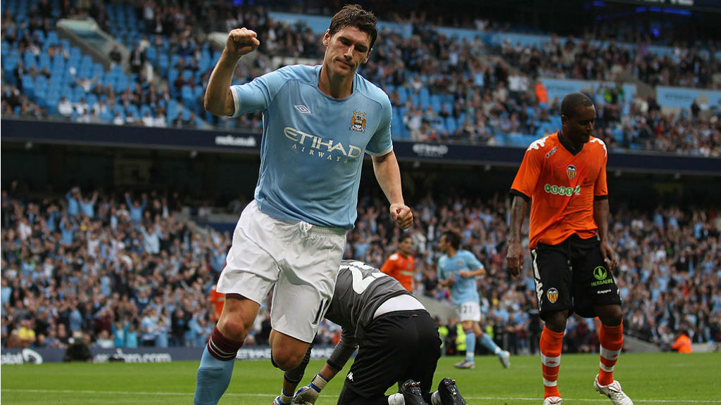 ON TARGET: Gareth Barry helped City to lift both the FA Cup and Premier League title in his time at the Club