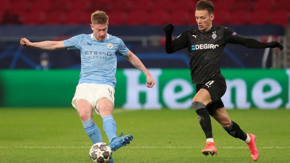 DELIGHTFUL DE BRUYNE: KDB releases the ball under close attentions from Hannes Wolf