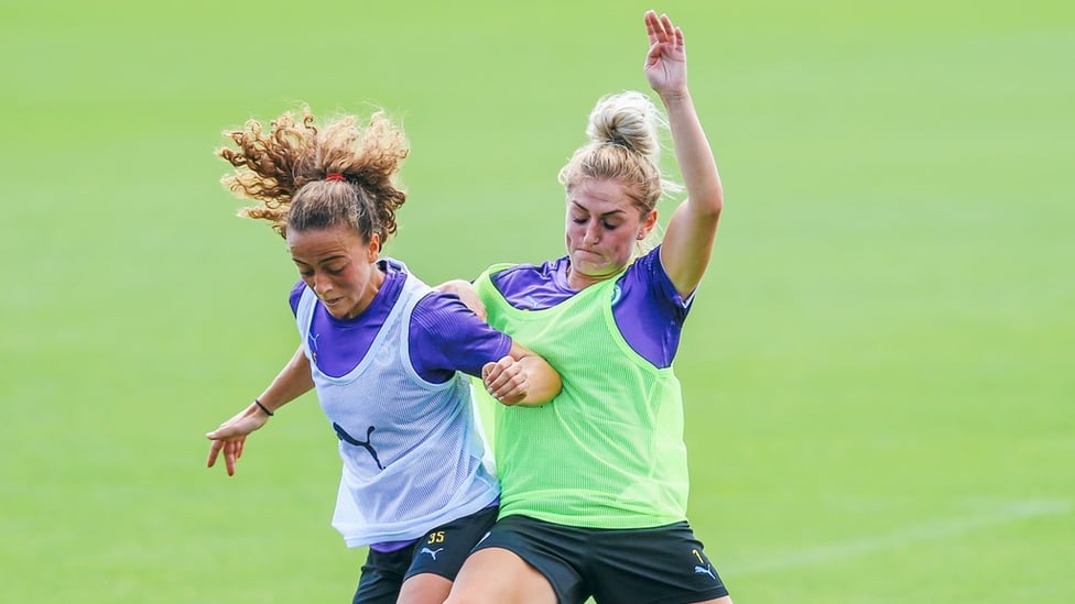 STEAL MY SUNSHINE : New signings Laura Coombs and Matilde Fidalgo battle each other for the ball