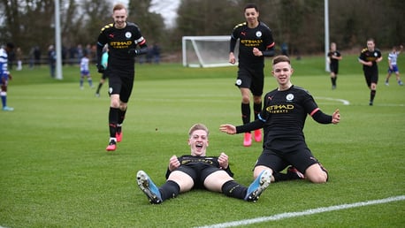 ALL SMILES: The City players celebrate after our second goal